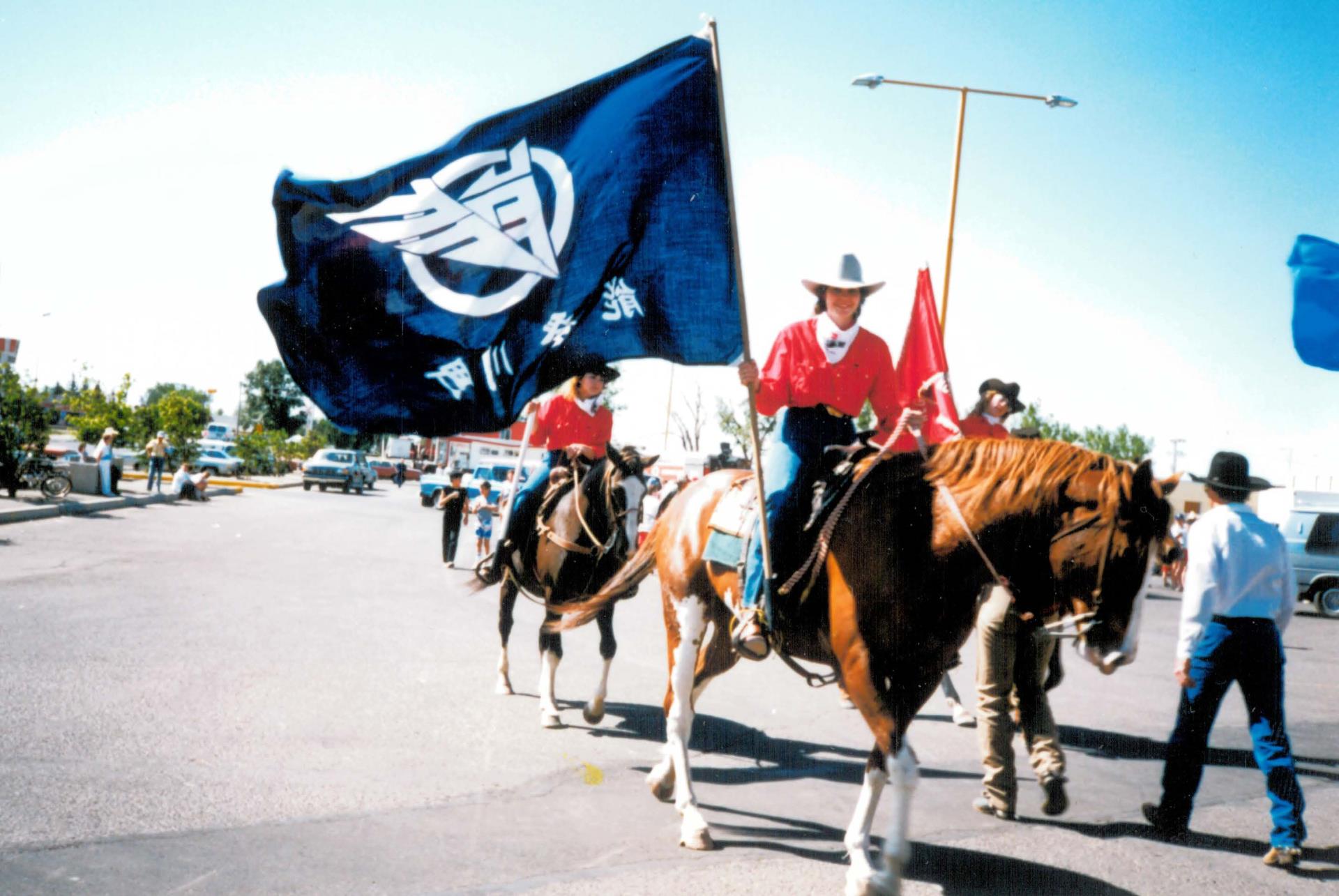 Notogawa Flag Flies in the Taber Parade